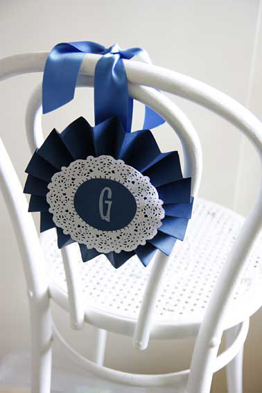 Paper rosettes for chair decorations