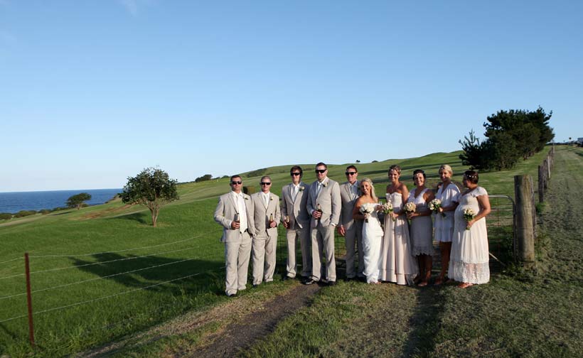 Bridal party at beach wedding