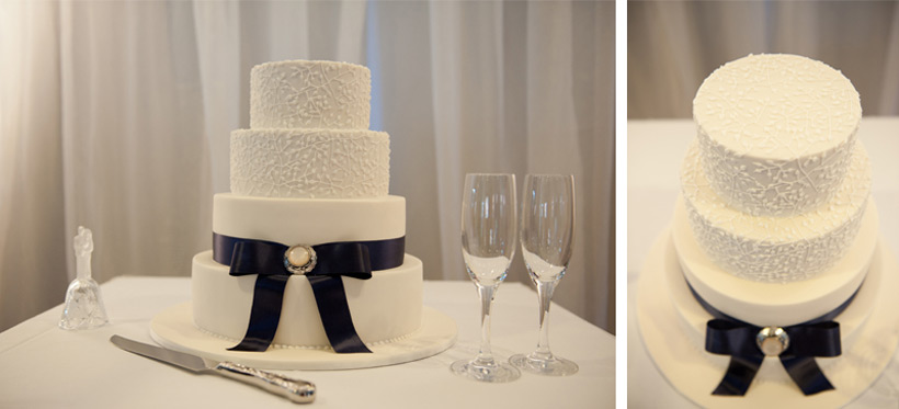 White wedding cake with navy blue