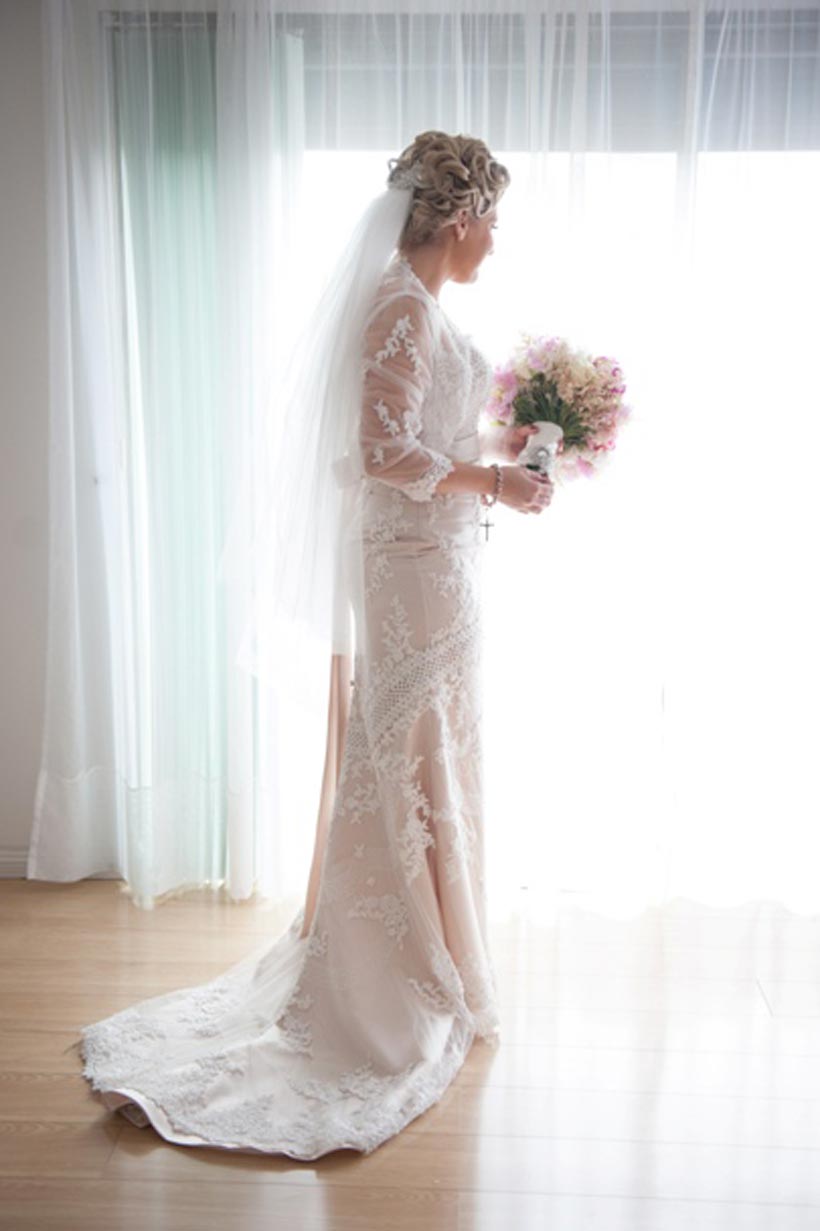 Danijela's beautiful lace wedding dress and cathedral length veil