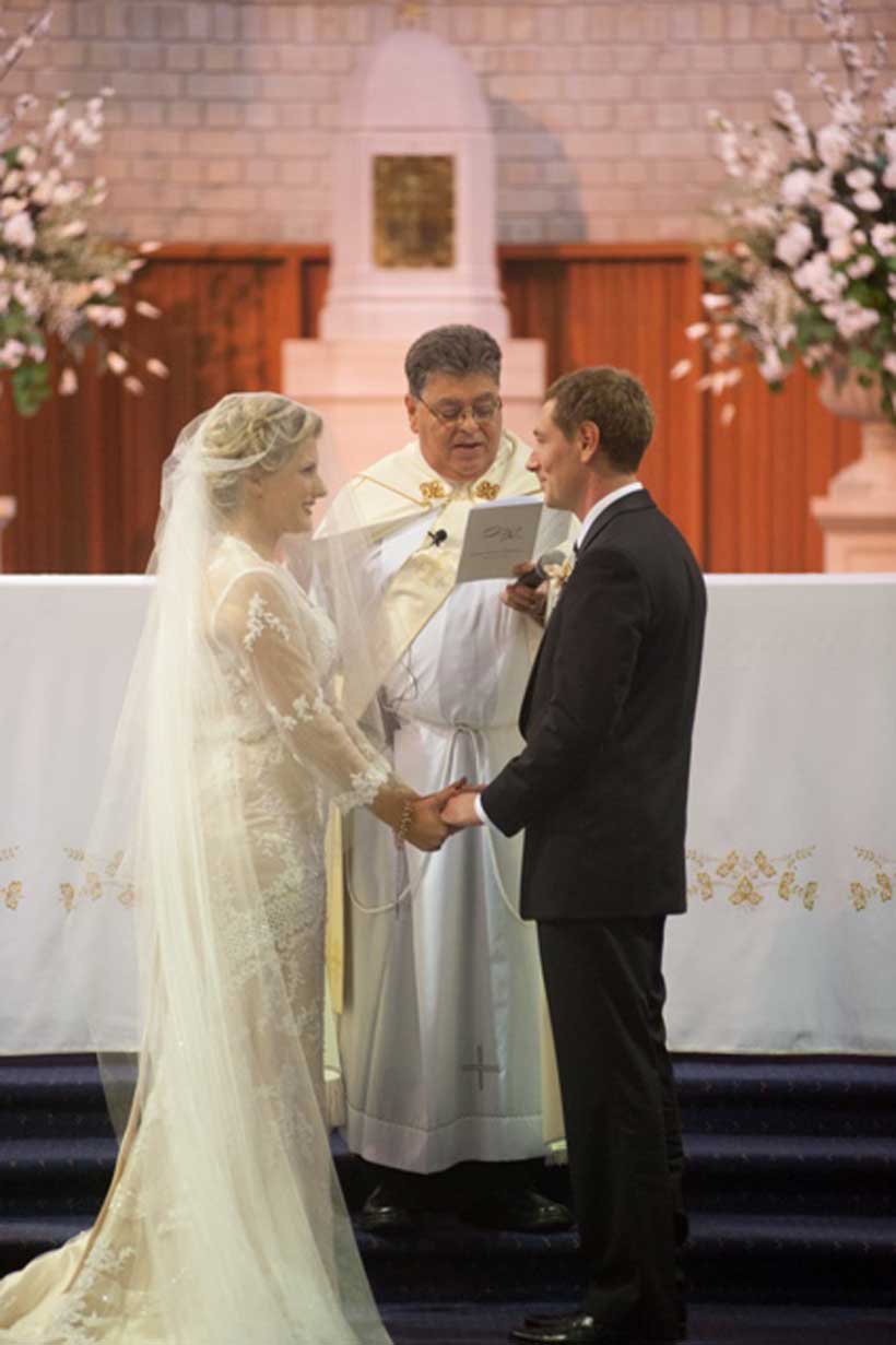 The couple married at St Charles Borromeo Catholic Church in Ryde 