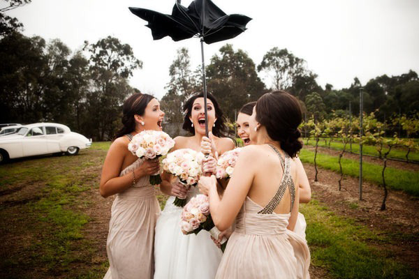 Bride and bridesmaids in storm