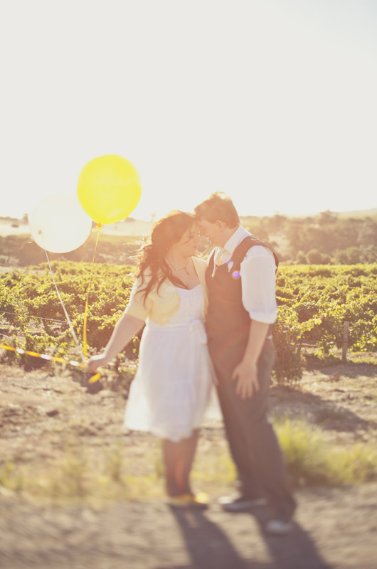 Bride and Groom with yellow balloon in e-shoot
