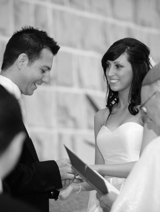 Bride and groom saying catholic vows