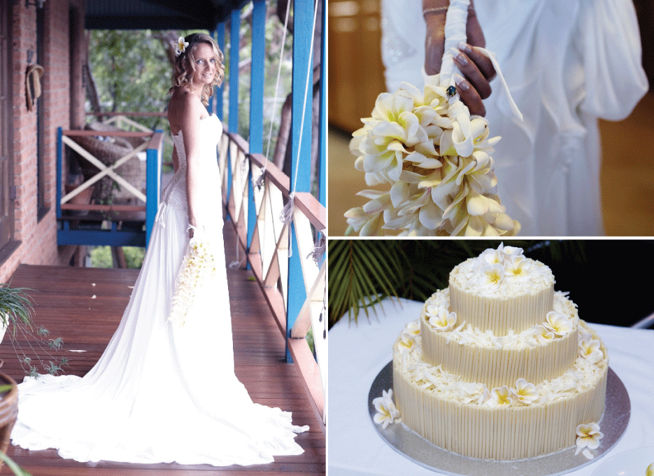 Bride wearing strapless gown, wedding bouquet and yellow wedding cake