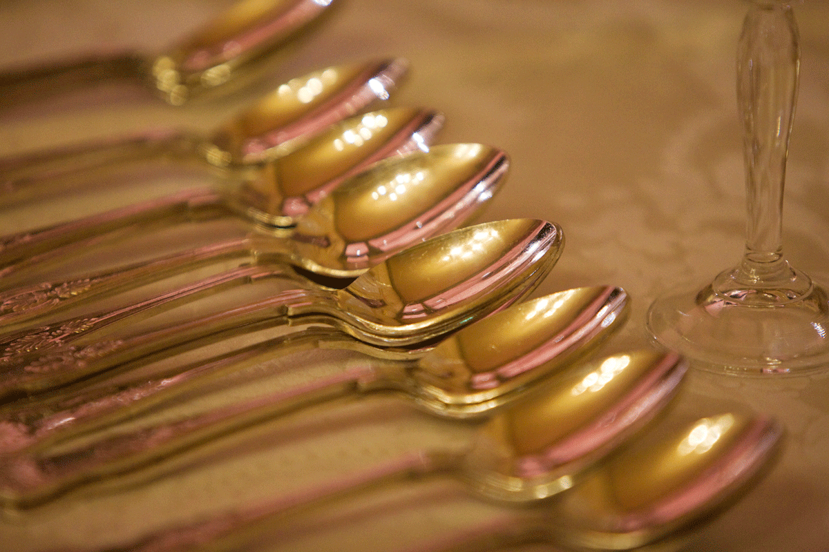Gold spoons - decor for reception