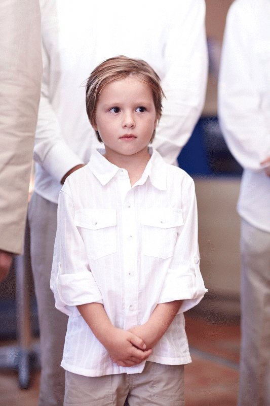 Page boy wearing tan and white