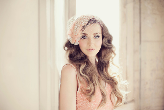 Blush pink couture headpiece with birdcage veil handmade by Viktoria Novak