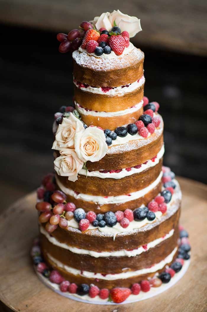 photographed by studio 60 - cake by cake designs - 20 Pretty Floral Wedding Cakes - Naked Cake with Berries