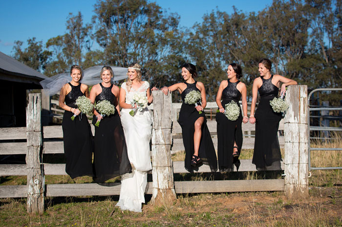 Bridesmaids in black dresses