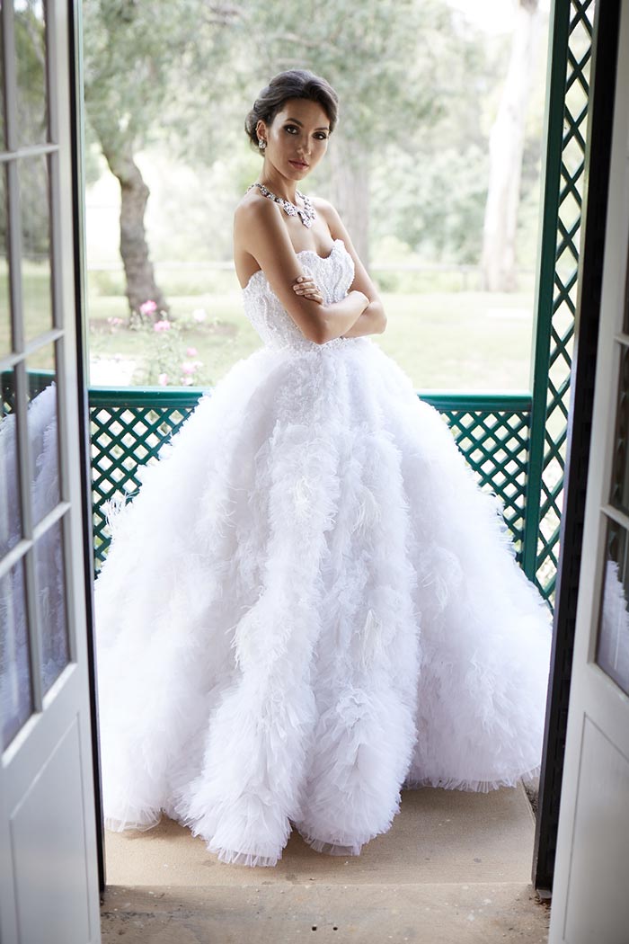 Gown is Velani By Nicky / Photography by Imagehaus Weddings / Hair and Makeup by Amelia Axton / Location is Old Government House Parramatta / Jewellery by Maria Elena Headpieces