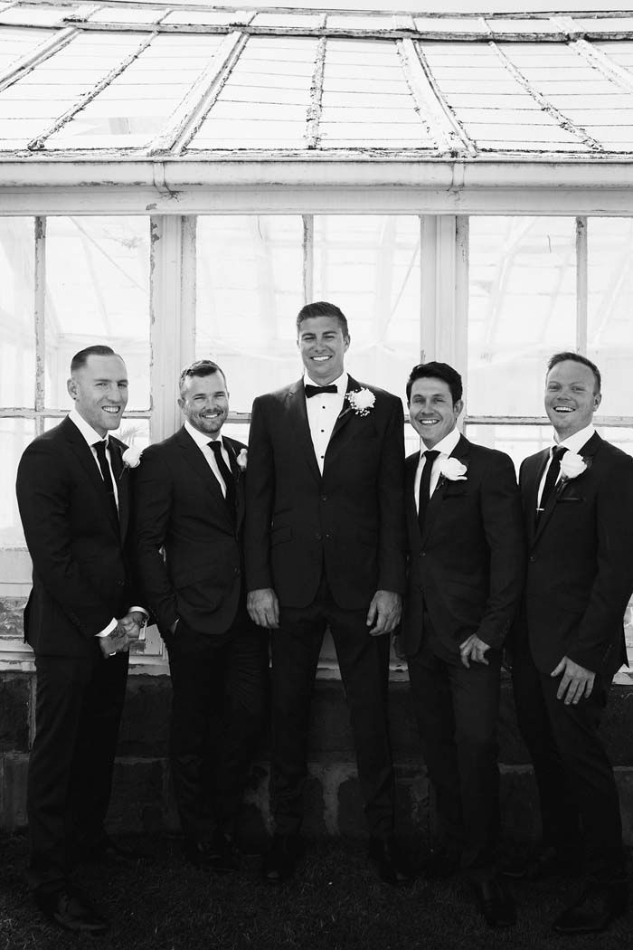 elegant real wedding groomsmen