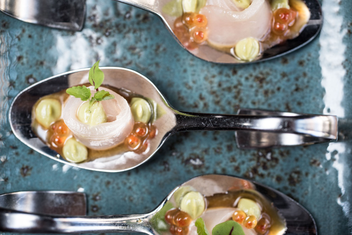 kingfish sashimi, ponzu sauce, avocado and salmon pearls