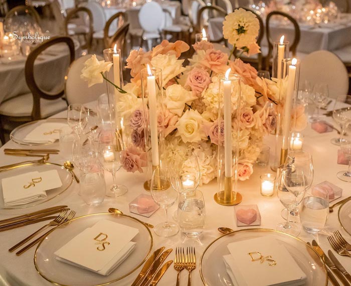 pink and cream styled round wedding reception table